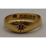 A 22ct gold ring inset with a single ruby 3.5g Location: