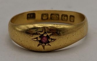 A 22ct gold ring inset with a single ruby 3.5g Location: