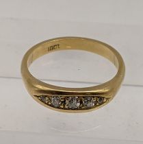 An 18ct gold boat style ring set with diamonds, total weight 4.4g Location: