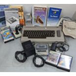 A collection of commodore items to include a commodore 64, commodore games to include punchy,