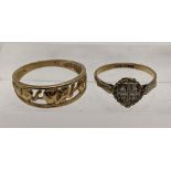 A 9ct gold ring having pierced detail in the form of three elephants, together with a 9ct and