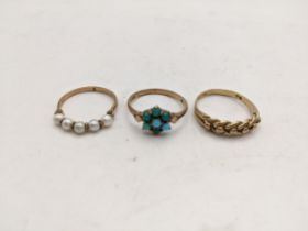 Three 9ct gold rings, one set with five small pearls, another set with non-precious stones in the