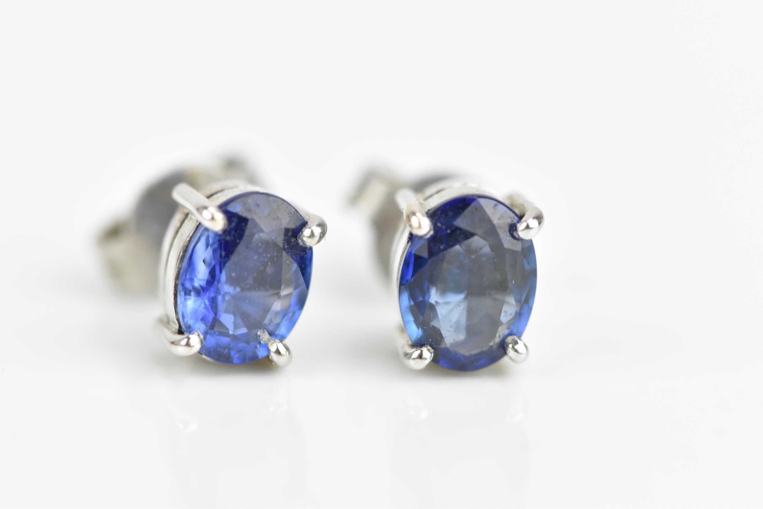 An 18ct white gold and cornflower blue sapphire and diamond parure, comprising a pair of stud - Image 10 of 10