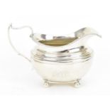A George IV silver milk jug by William Bateman I, London circa 1820s (date letter partly rubbed),