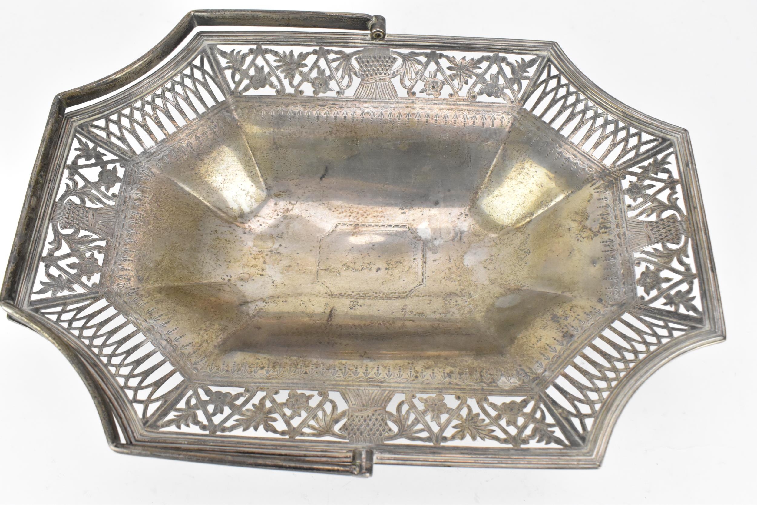 A Victorian silver fruit basket by Goldsmiths & Silversmiths Co, Sheffield 1895, with swing - Image 3 of 7