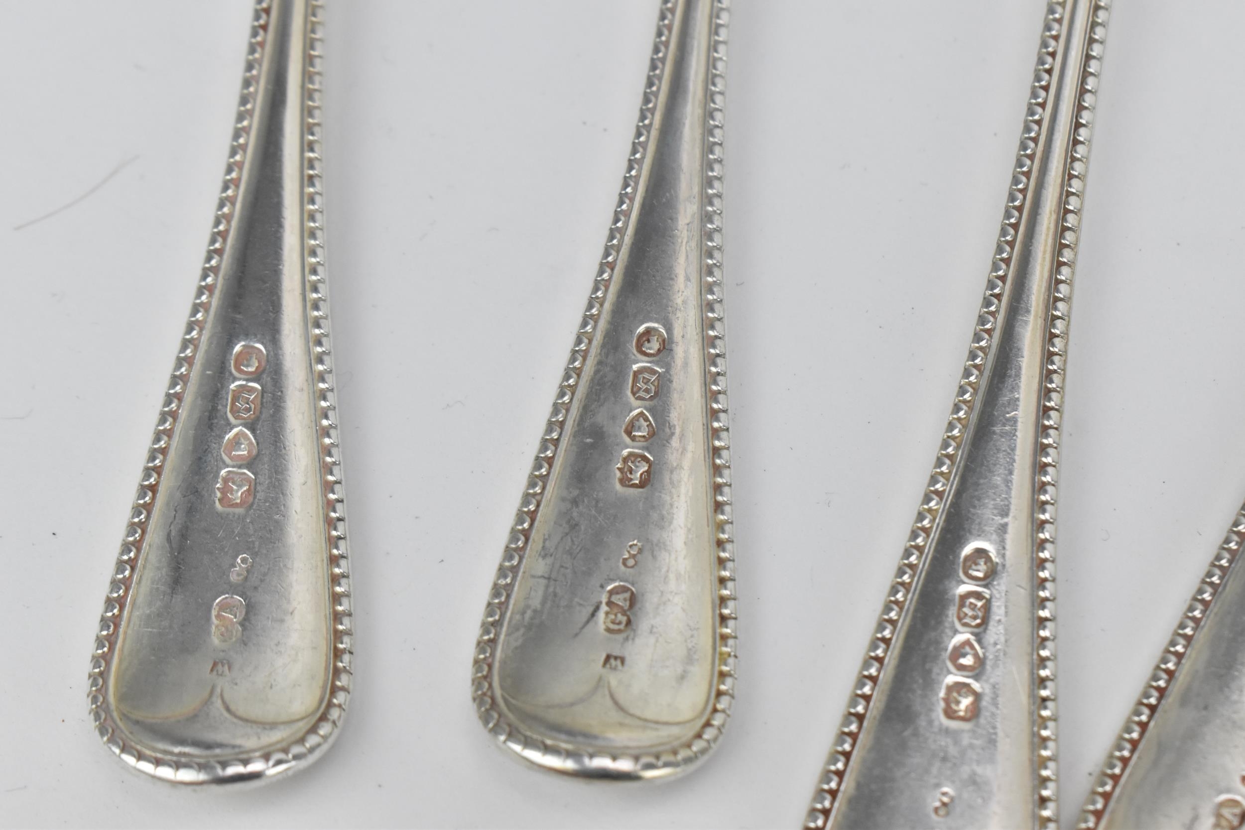 A George III and later matched flatware service, in the Old English and bead pattern, six setting, - Image 10 of 10