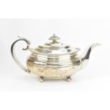 A George III silver teapot by Solomon Hougham, Solomon Royes & John East Dix, London 1818, rounded