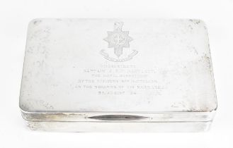 A George VI silver cigarette box by Munsey & Co, London 1940, gifted to 'Captain J.A.P Bartlett'