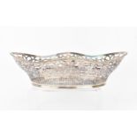 A Continental silver fruit basket, 20th century, of boat form with beaded rim, above a foliate