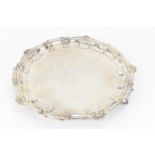 An Elizabeth II silver salver by The Albion Chain Co, London 1971, with scroll and shell border,