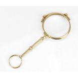 A 9ct yellow gold framed lorgnette, with pull down action in working order, total weight