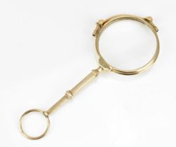 A 9ct yellow gold framed lorgnette, with pull down action in working order, total weight
