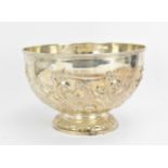 An Edwardian silver punch bowl by Sibray, Hall & Co Ltd, London 1901, of circular form with embossed