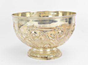 An Edwardian silver punch bowl by Sibray, Hall & Co Ltd, London 1901, of circular form with embossed