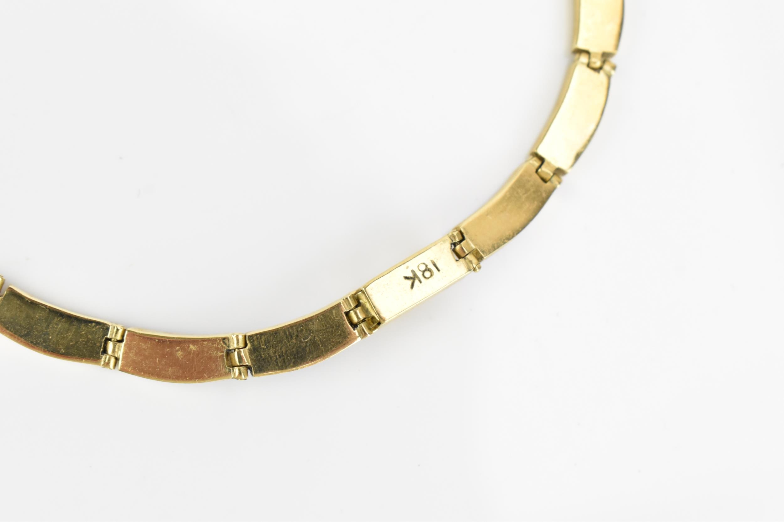 A yellow metal and lapis lazuli necklace, with curved rectangular links each inset with lazuli - Image 5 of 5