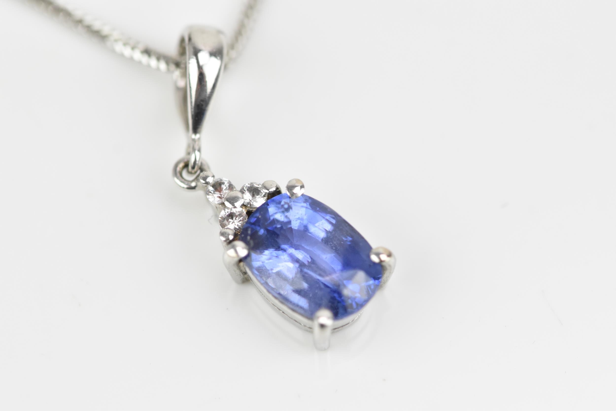 An 18ct white gold and cornflower blue sapphire and diamond parure, comprising a pair of stud - Image 6 of 10
