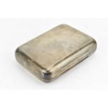 A Victorian silver cigar case by Thomas Johnson I, London 1872, of rectangular form with rounded