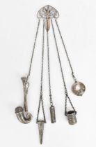 An Edwardian silver chatelaine by Hilliard & Thomason, London 1901, the clip with scrolled design,