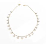 A gold-plated and moonstone necklace, set with hanging circular cabochon stones, 41 cm long