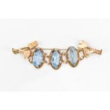 A middle Eastern yellow metal and blue stone bracelet, possibly Iranian or Egyptian gold, with