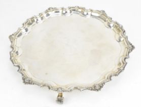 An Elizabeth II silver salver by Adie Brothers Ltd, Birmingham 1960, with shell and scroll moulded
