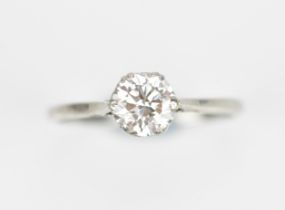 A platinum set diamond solitaire ring, the brilliant cut stone approx 1 carat, in a pierced