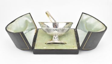 A cased Victorian silver sugar basket by Dimier Brothers, London 1895, of navette form with part