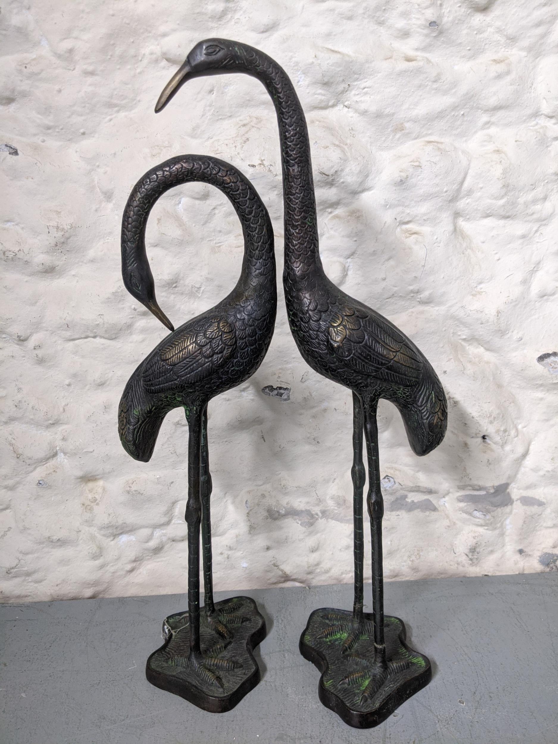 A pair of Japanese style patinated model storks Location: