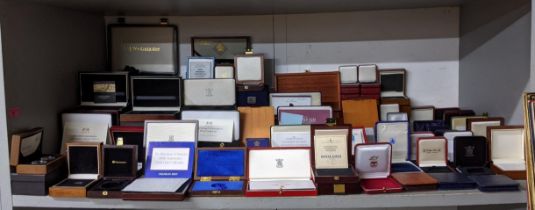 A collection of empty wooden and other coin cases Location