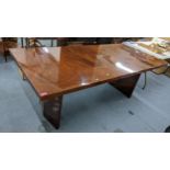 A modern walnut finished rectangular dining table supported by two pedestals, 71cm h x 195cm w