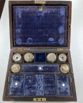 A late 19th/early 20th century vanity box, having blue fitted interior and contents, A/F Location: