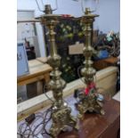 A pair of brass table lamps, 65cm high Location: