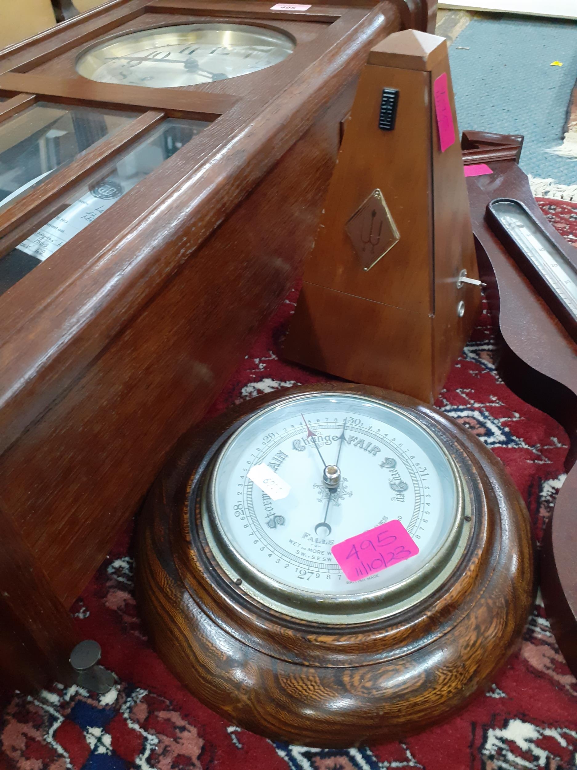 A Westminster chime wall clock with key in oak case together with a circular oak cased wall - Image 2 of 2