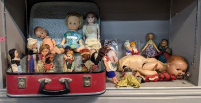 Dolls and accessories with mobile limbs, some damaged and not complete to include ceramic examples