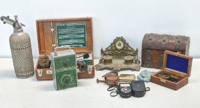 A mixed lot to include a 19th century ink well stand with a clock, along with a Weston master