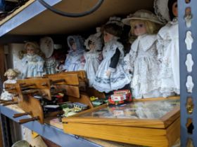 A selection of toys and other items to include many collector's dolls, various Lledo Days Gone model