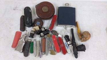 A mixed lot to include pen knives, two pipes, hip flask and other items Location;