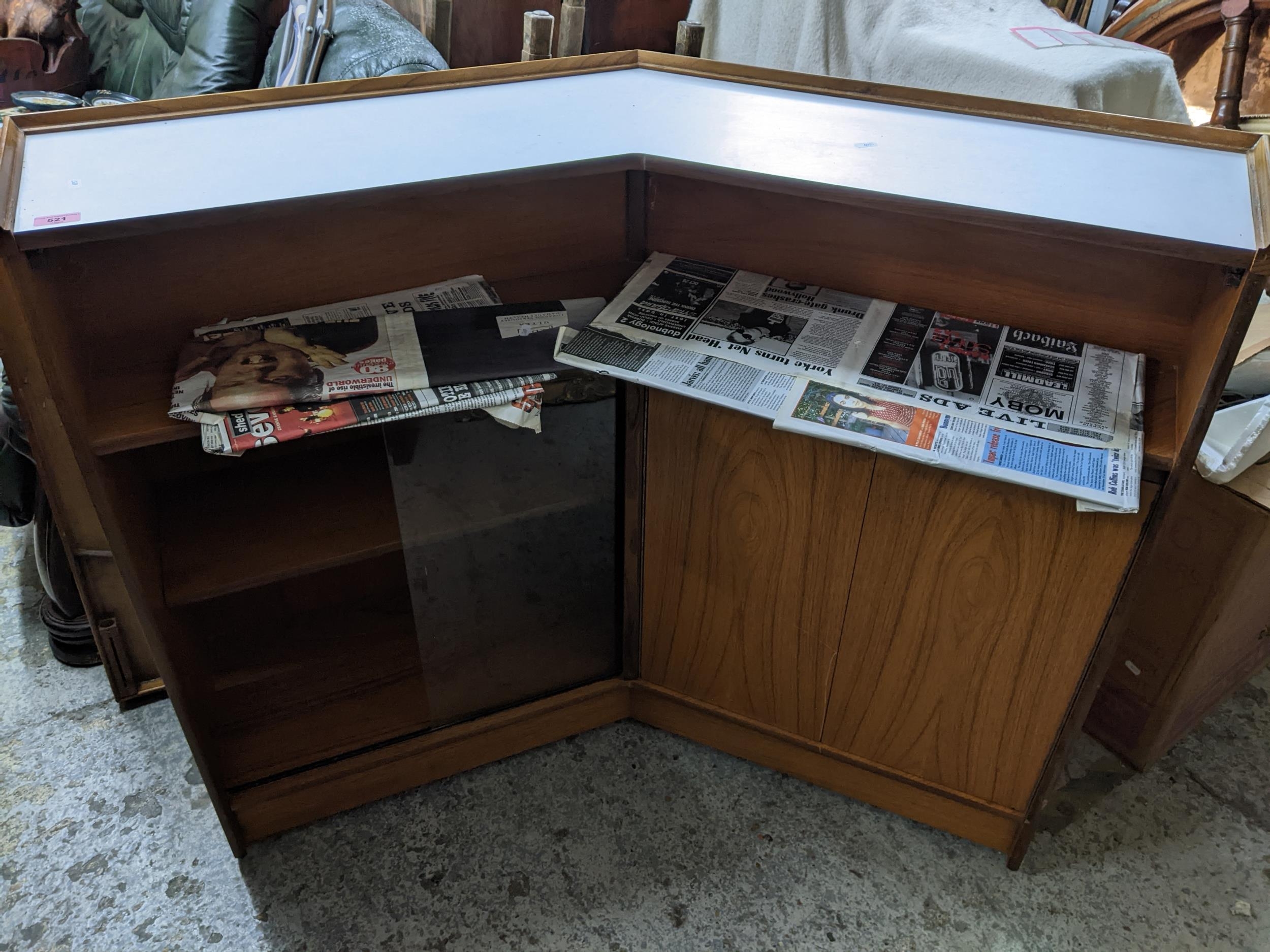 Turnidge of London, mid-century teak cocktail bar, circa 1970, corner unit with side panel, white