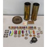 A collection of WWI and WWII miniature medal bars to include a Royal Naval Reserve decoration and