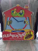 A late 20th Century Sherlegs The Fleabusters for total flea control, battery powered clock Location:
