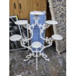 A white painted cast iron Coalbrookdale style six-shelf plant stand Location: