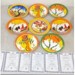 A small collection of Wedgwood - Clarice Cliff collectors plates along with certificate of