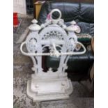 A white painted cast iron Victorian style umbrella stand Location: