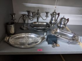 A selection of silver plate and pewter ware to include a pair of candelabras, an hors d'oeuvres dish