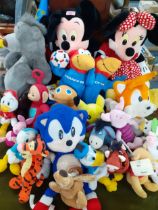 A quantity of soft toys to include Disney characters, Olympic France 98, Teletubbies and Sega