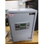 A Safeon metal home safe with keys Location: