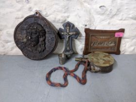 Religious artefacts to include a Corpus Christie and cup, a plaque of Jesus and the last supper