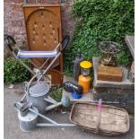 A mixed lot to include early 20th century galvanised watering cans, kumbokatel board and other items