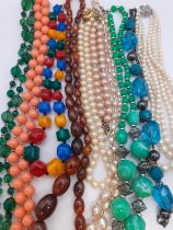 A quantity of costume jewellery to comprising vintage brooches necklaces and earrings to include a