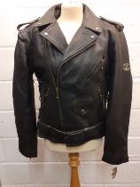 A K.J Bikers Wear black leather ladies bikers jacket having a half belt to the hem, multi zip